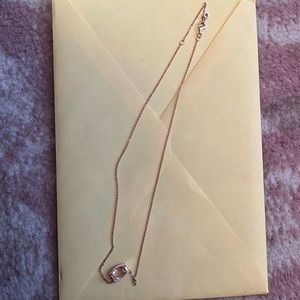 Rose gold Kendra Scott necklace